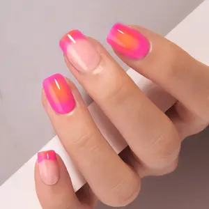 Radiant Sunset Glow – A vibrant nail art design that blends neon pink and warm orange into a flawless gradient, creating a luminous, sunset-inspired look. Perfect for making a bold fashion statement, these glossy and modern elegance in every light.