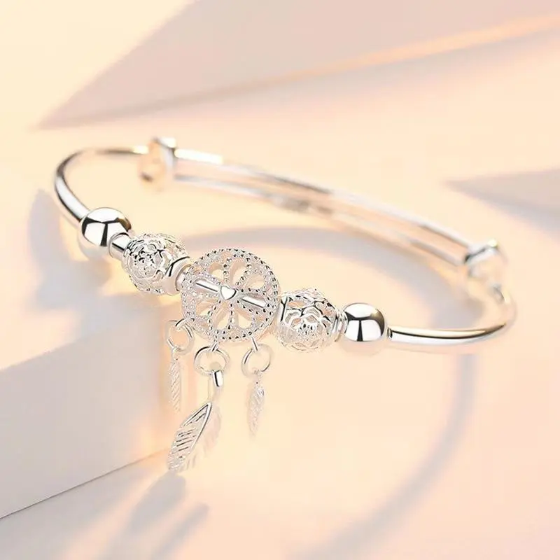 Korea selling dream catcher feather silver push-pull button adjustable bracelet temperament summer ladies fashion copper bracelet.