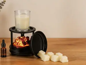 4-in-1 electric fragrance warmer with timer function. Multi-use as a wax melt burner and oil diffuser. Campfire-style design, ideal for home, bedroom, office decor and gifting.