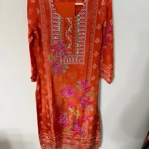 orange and pink crepe suit with crepe dupatta