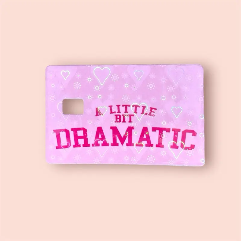 Hearts holographic Pink Dramatic Debit Card Skin with "A Little Bit Dramatic" Text for Stylish Protection