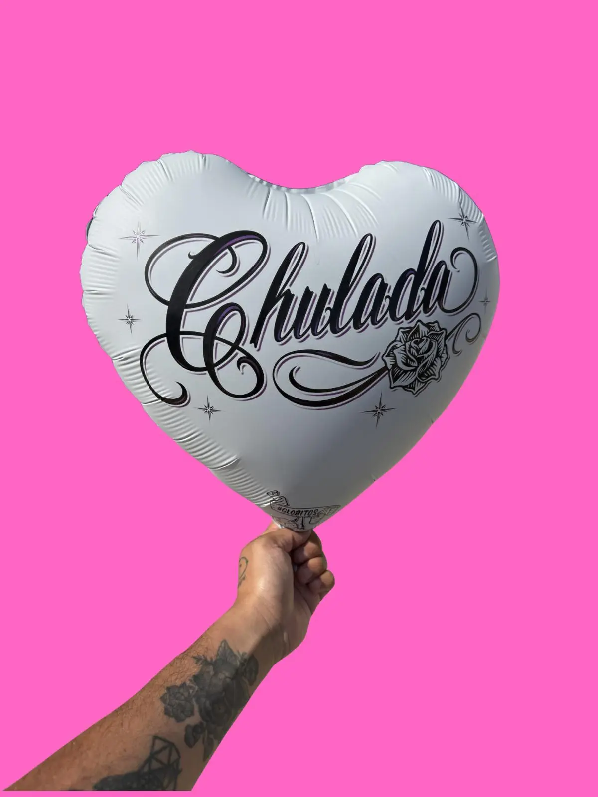 Chulada 18 inch heart shape globito which translates to Cutie