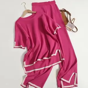 Moon Home clothes prepared for the party. Soft and elastic knitted top and wide-leg pants. Comfortable pajamas, suitable for casual outings and relaxing at home. Solid color round neck with a patchwork design. Women's cardigan and pants GARMENTARY