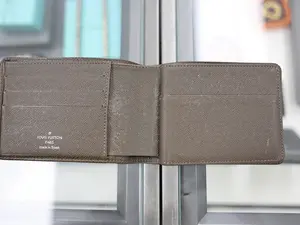 Pre-owned Louis Vuitton LEATHER Clutches & Wristlets LV WALLET BROWN