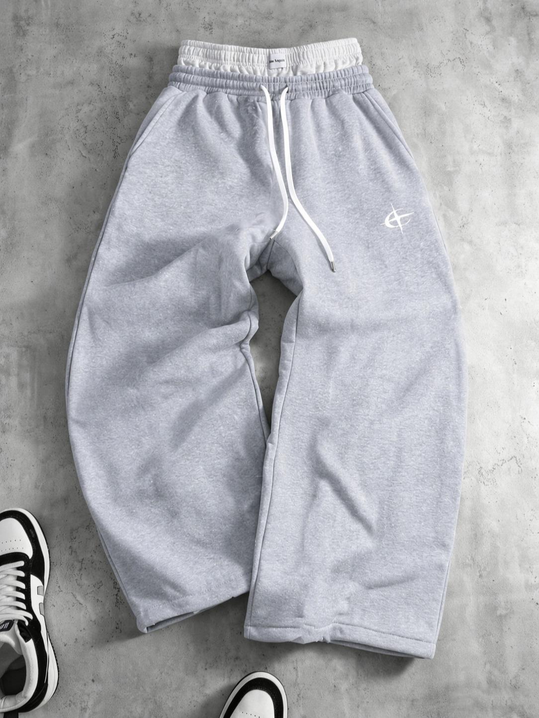 Two-pack unisex Y2K street style joggers, double-waist workout joggers featuring a star print faux two-piece design with contrasting double waistband detailing; loose, casual jogging pants for both men and women, perfect for creating fashionable looks, ve