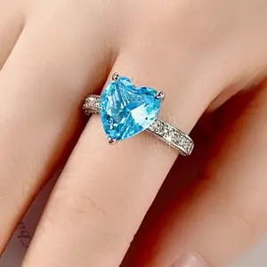 Blue ice heart crush ring