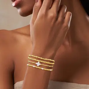 ASCOMY 14k Gold-plated 4-Piece Stackable Gold Beaded Bracelet Set | Boho Pearl & Cross Charm Design | Trendy Layered Wrist Jewelry for Women | Everyday & Party Chic Vibes