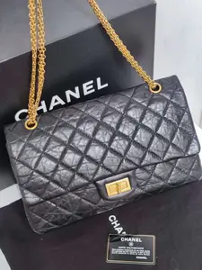Pre-owned CHANEL Lambskin Shoulder Bags 2.55 Collection, 14, Black and Gold Flap Bag with Gold Buckle and Chain Strap