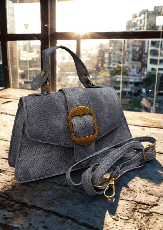 Elegant Jean Handbag with Gold Accents Secure Closure for Everyday Use Stylish and Durable