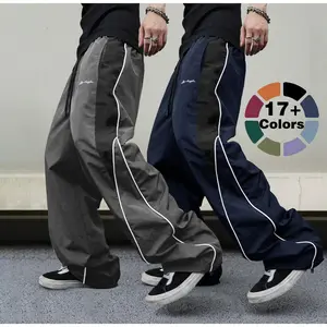 Men's lightweight and breathable sports pants, vintage stitching wide-leg pants, drawstring elastic waist, loose straight-cut casual pants, campus commuting street fashion long pants