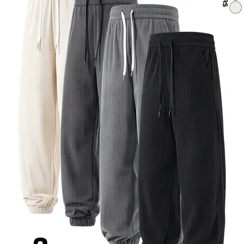 Available in packs of 4, 3, or 2. Men’s retro solid-color fleece jogger pants for autumn/winter, loose street-style sweatpants; casual solid-color long pants; loose wide men’s jogger pants.