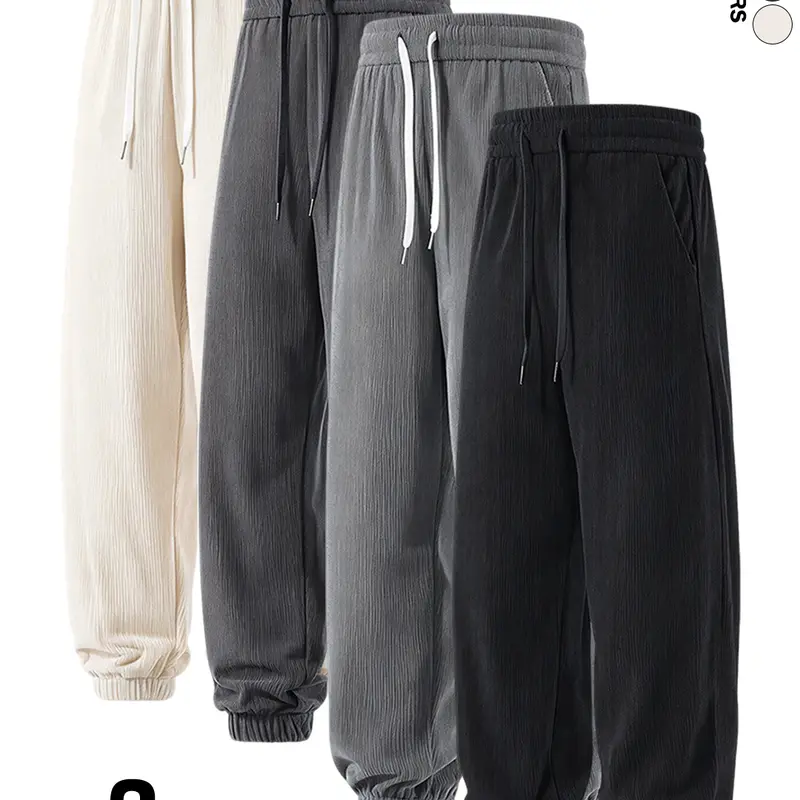 Available in packs of 4, 3, or 2. Men’s retro solid-color fleece jogger pants for autumn/winter, loose street-style sweatpants; casual solid-color long pants; loose wide men’s jogger pants.