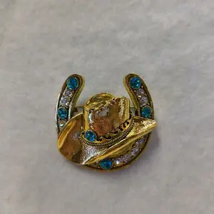 Western Horse Shoe Pin with Gold Hat and Blue Stones for Cowboy Outfits
