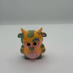 3D Printed Adorable Multicolor Cow Figurine with Horns and Unique Design for Collectors