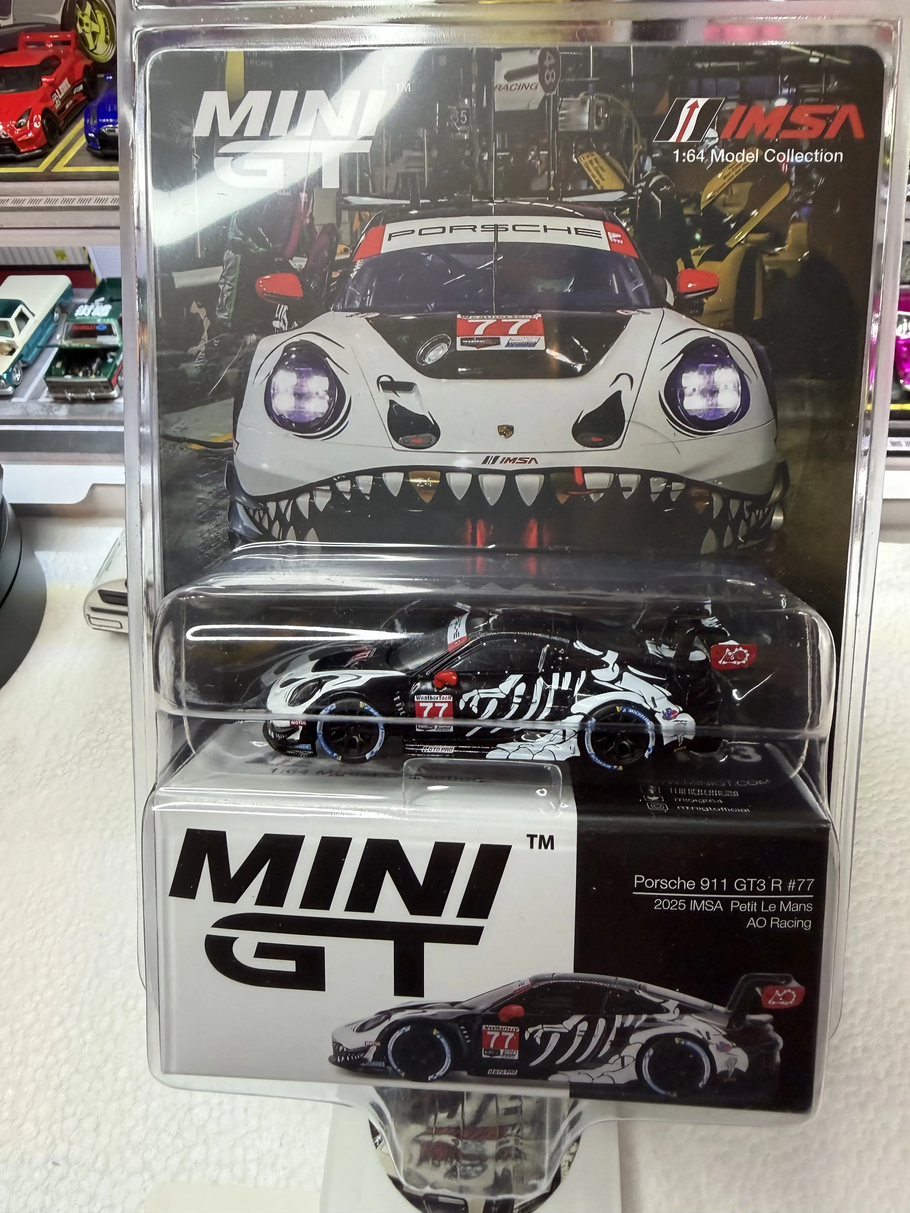 Mini GT Porsche 911 GT3 R #77 diecast model.Skely