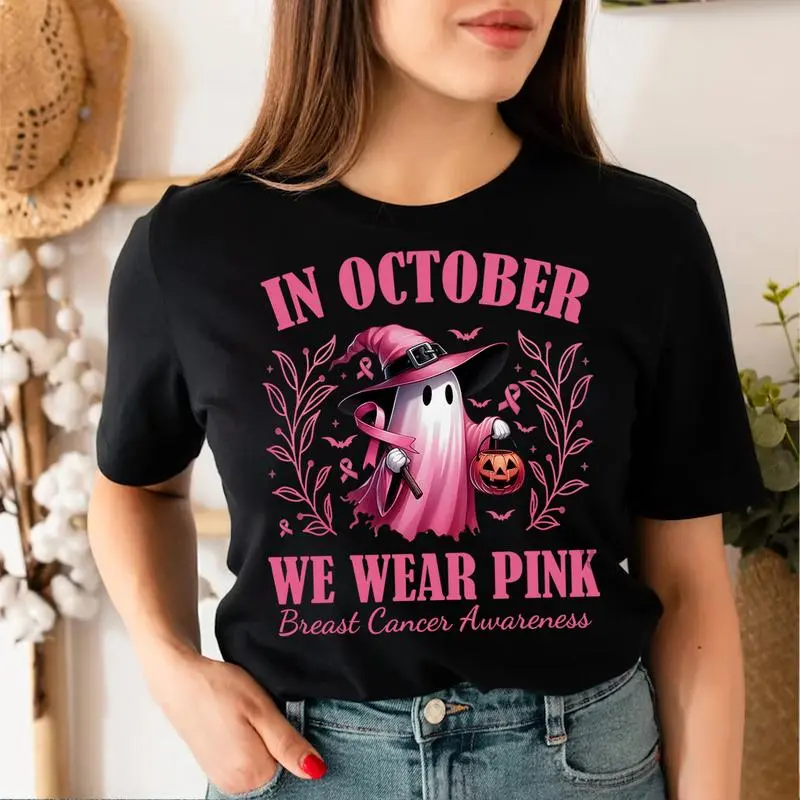 In October, we wear pink ghost shirts, Halloween breast cancer awareness shirts, pink ribbon shirts, and unisex gift T-shirts