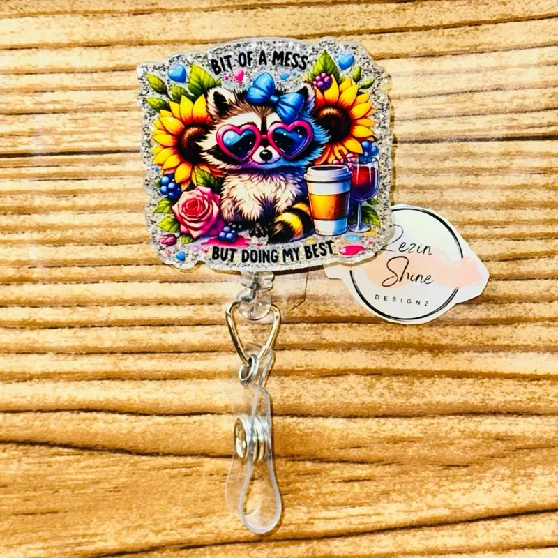Bit Of A Mess Raccoon Badge Reel