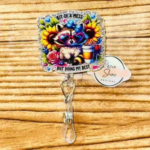 Bit Of A Mess Raccoon Badge Reel