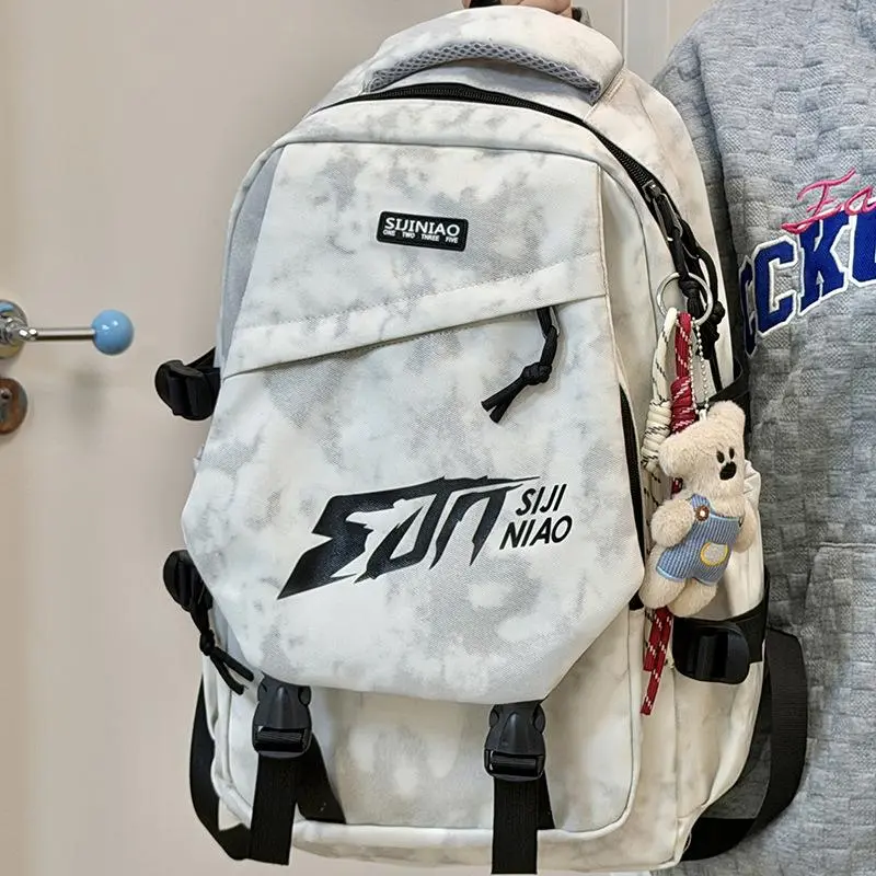 Japanese backpack male high school college student retro lightweight weight weight reduction large capacity schoolbag travel backpack female tide