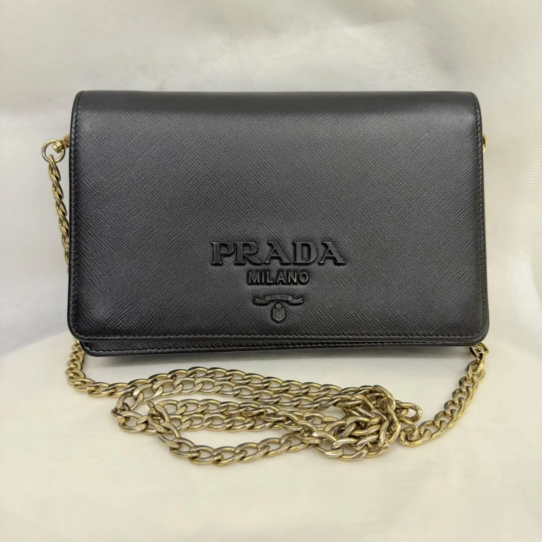 Pre-owned PRADA Saffiano Black Leather Chain Shoulder Bag with Gold Tone Hardware (98% New)