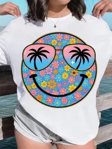 Casual Short-Sleeve T-Shirt for Women in Plus Sizes Featuring a College-Style Floral Happy Face And Tropical Beach Design Made from 100% Breathable. Ideal for Spring Summer And Fall