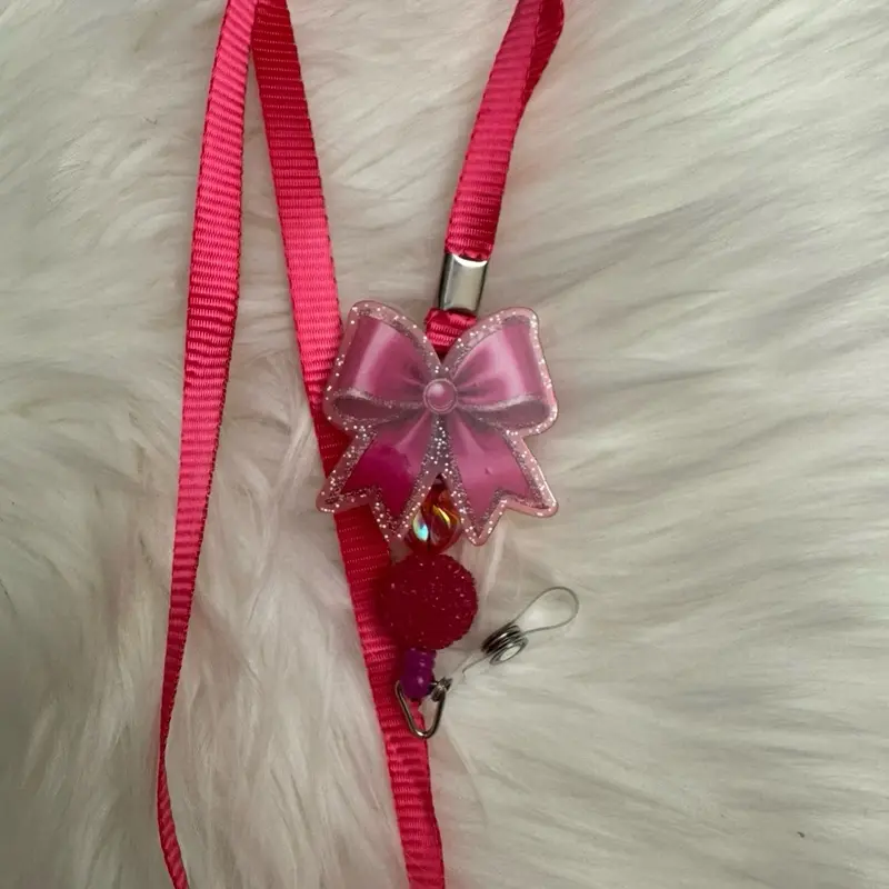 Bow Badge Reel Lanyard with Pink Ribbon and Sparkling Bow Design
