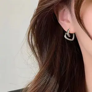 Women's Heart-Shaped Metal Ear Studs, Korean Style Minimalist Design, Cold-Weather Fashion Accessory, Unique Women Jewelry