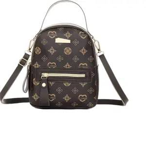 City Luxe Backpack - Black with Gold Monogram Design, Adjustable Straps, Zipper Closure, Stylish and Functional
