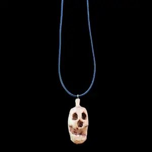 Carved jack-o-lantern necklace