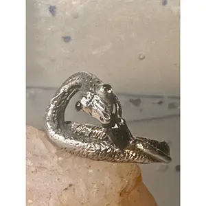 Snake ring size 6.50 holding a stone probably onyx purple stone eyes sterling silver women