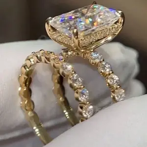 A set of two 14k gold-plated engagement rings for women, set with Zirconia stones, suitable for everyday wear, weddings, or anniversaries.