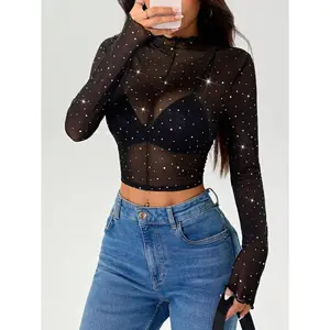   Sparkly Sheer Mesh Mock Neck Crop Top RhinBlack Rhinestone Sheer Mesh Long Sleeve Crop TopRhinestone Sheer Mesh Crop Top |   Viral Baddie  Black Sparkly Mesh Long Sleeve Top |   Y2K Party Girl VibeRhinestone Embellished Sheer Top |   That Girl Night Out