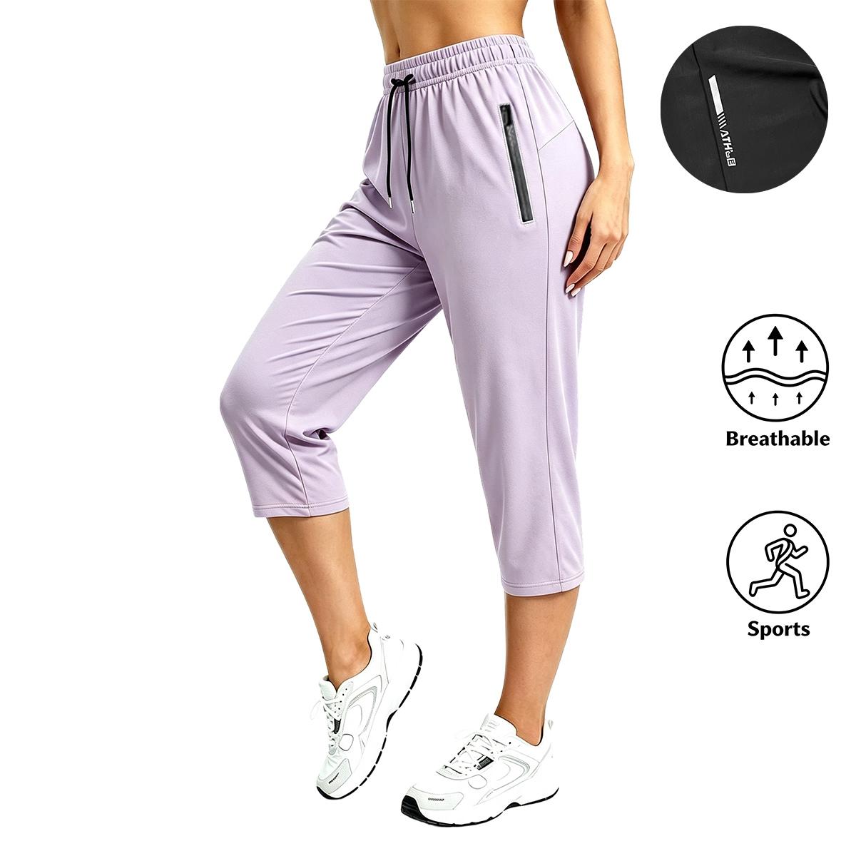 Four-pack women’s athletic capri pants made from breathable fabric for sports, featuring an elastic drawstring waistband that is comfortable and doesn’t constrict. Suitable for running, yoga, workouts, and everyday casual wear; machine washable and easy t