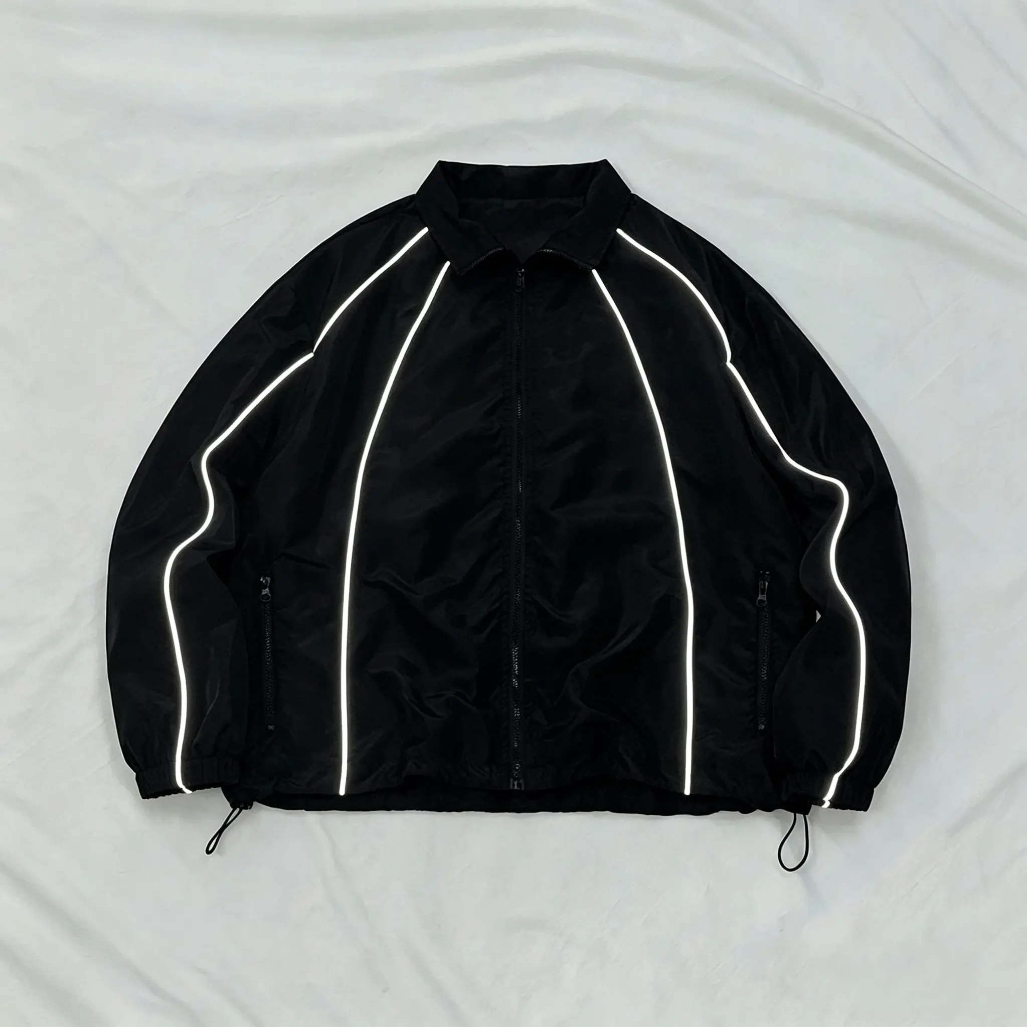 Unisex 3D reflective strip cropped windbreaker with notched lapels – contrasting reflective lines, drawstring hem, lightweight woven fabric, dropped shoulders, relaxed fit, American high-street jacket for night cycling and street style