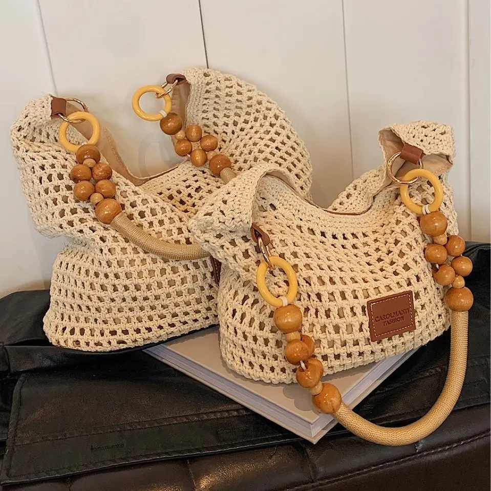 Beach vacation woven bag for women 2026 new hollow-out knitted handbag large capacity shoulder underarm bag