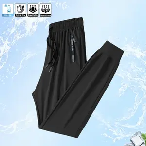 Men's light ice silk skin-friendly casual pants with large zipper pockets and drawstring belts, light and breathable casual elastic ice silk pants, simple solid color fashion bundle pants, trendy versatile and quick-drying drawstring pants