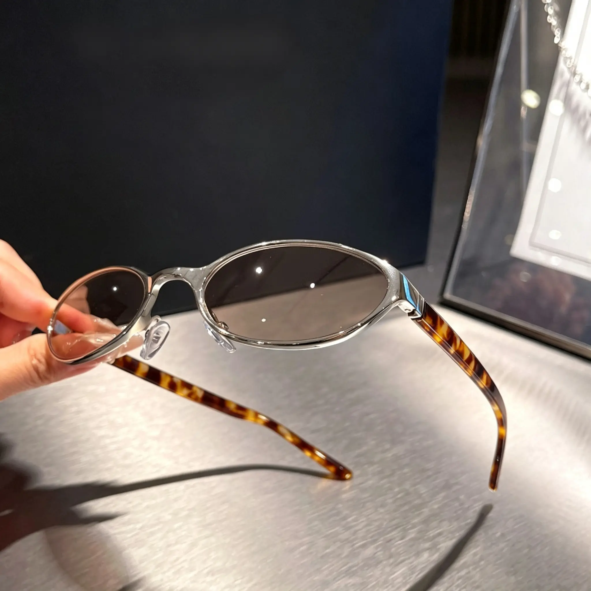 Y2K Mini Slim Oval Sunglasses for Women - Silver Metal Alloy Frame, UV400 Solid Tint Lenses, Narrow Fit Unisex, Choice of Black or Tortoiseshell Acetate Temples, Lightweight Adjustable Nose Pads