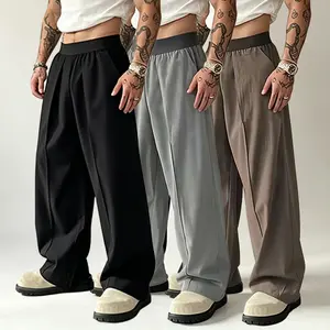 Men’s high-waisted pleated wide-leg pants, relaxed fit casual trousers with drape, comfortable elastic-waist work pants for streetwear and office