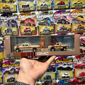 M2 GMC Sierra 1500 and GMC Diecast Truck hauler Desert Fox set 1:64 scale