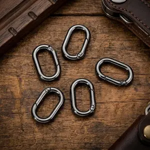 Quick Release Oval Spring Buckle Keychain: Anti-Rust Plated Backpack Expander Connector for Dorm Keys, Travel Bag Organization, Sports Gear, and Outdoor Carabiner Hook