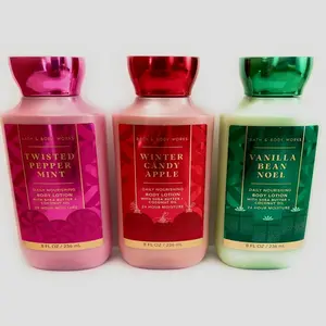 NEW - Bath and Body Works Holiday Traditions Christmas Lotion Gift Set of 3 Full Size Body Lotions: Vanilla Bean Noel, Winter Candy Apple, and Twisted Peppermint (Large 8 ounce bottles)