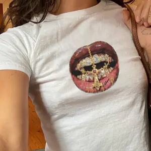 Icy Lips and Grillz Baby Tee, Graphic Shirt, Baddie Aesthetic Short Sleeve Top, Women's Y2K Baby Tee, Diamond Mouth Graphic with Gold Cross Pendant Print