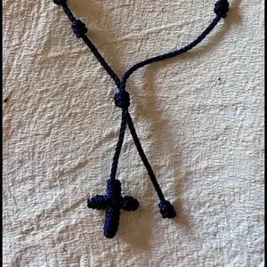Navy blue knotted cord rosary bracelet