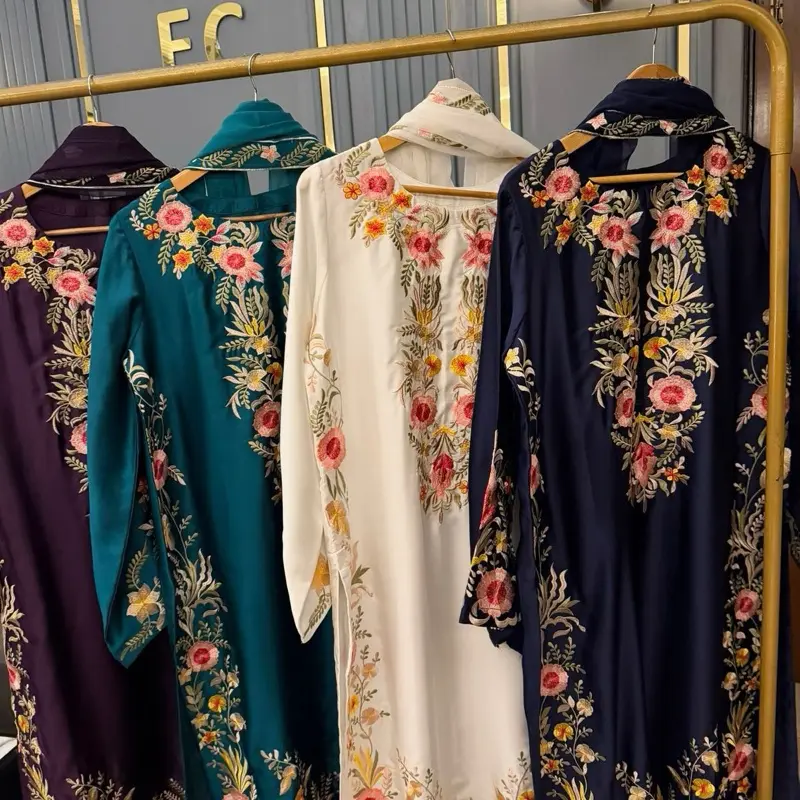 Pakistani Embroidered Silk Suit. Length 45 inch. Please check the length before ordering. M Body Size 42 Inch  L Body Size 44-46 Inch  Shirt material: Silk  Pant: Silk and Dupatta: Chiffon