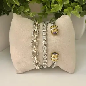 Bracelet Stack Includes Two Tone Magnetic Closure Bracelet, Tennis Bracelet and Braided Cuff Bracelet with Purple Accent Stones