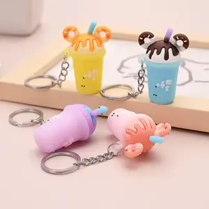 Cutesy Milk Tea Key Chain - Adorable Donut Topped Cup Design - Durable Lightweight Key Accessory - Random Color Selection - Perfect for Casual Use