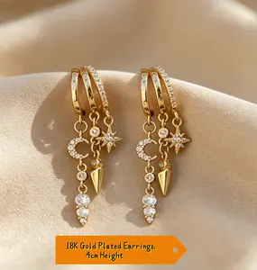 18K Gold Plated Celestial Moon & Star Stacked Hoop Earrings, 4cm Drop. Versatile for everyday women's wear, featuring long-lasting shine, anti-tarnish finish, and hypoallergenic design. The perfect gift for birthdays, anniversaries, and special occasions.