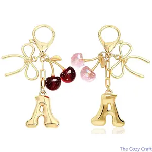Cute Alloy Bubble Letter Keychain for Women, Sweet Cherry Bow Key Ring, Stylish Bag Charm Pendant, Dainty Trendy Accessory, Versatile Decorative Hanging Ornament for Handbags, Backpacks, Daily Matching and Holiday Gift‑Giving