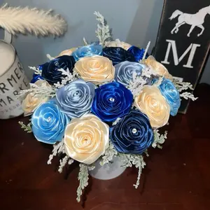 Winter Themed Flower Bouquet in Blues and ivory with Snowy Accents and Elegant Design