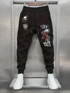 Graffiti Skull & Eye Graphic Sweatpants - Edgy Streetwear Joggers Unique Graphics